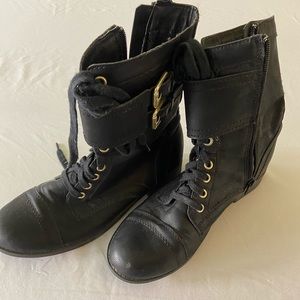 Lace up combat boots with buckle